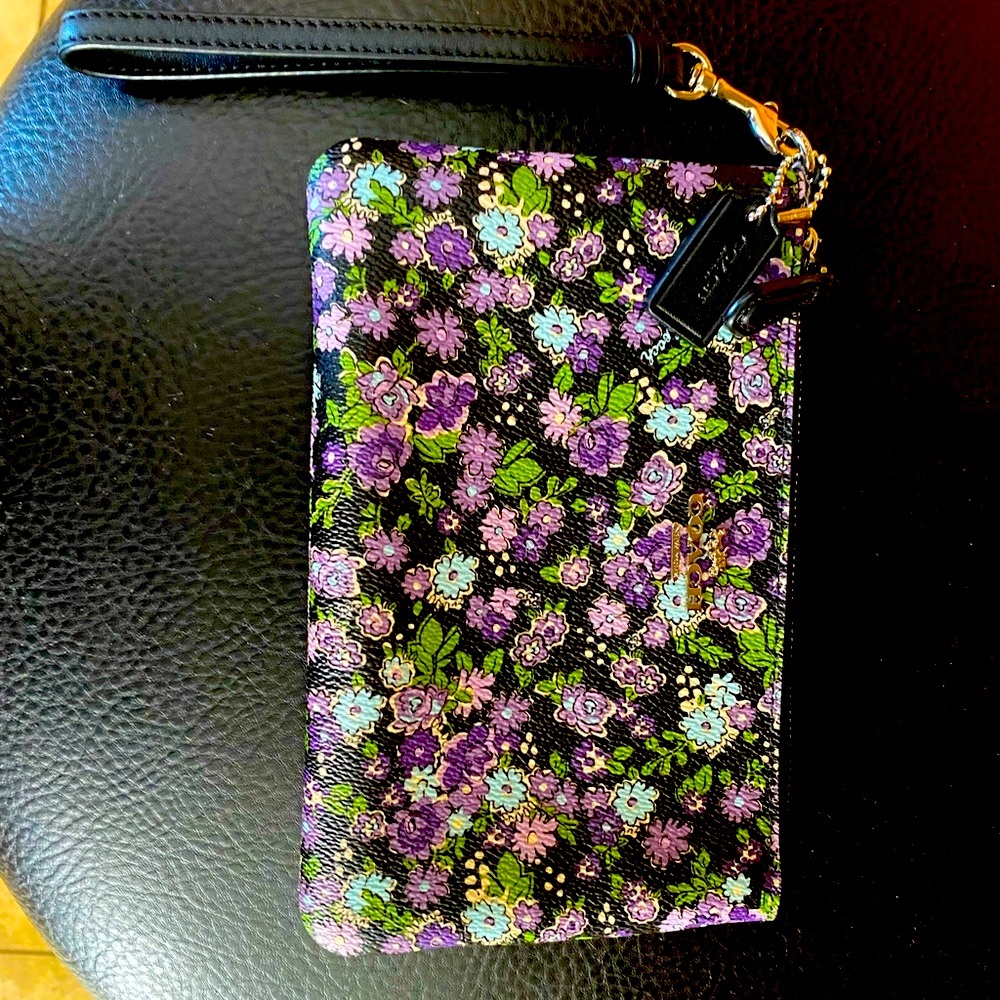 Coach Wristlet black with flowers and purple interior
